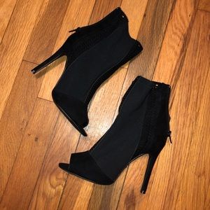 Black zip up heels